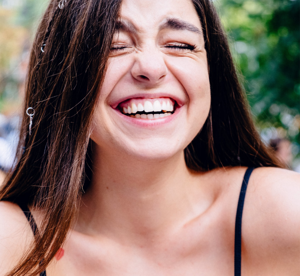 girl smiling and laughing